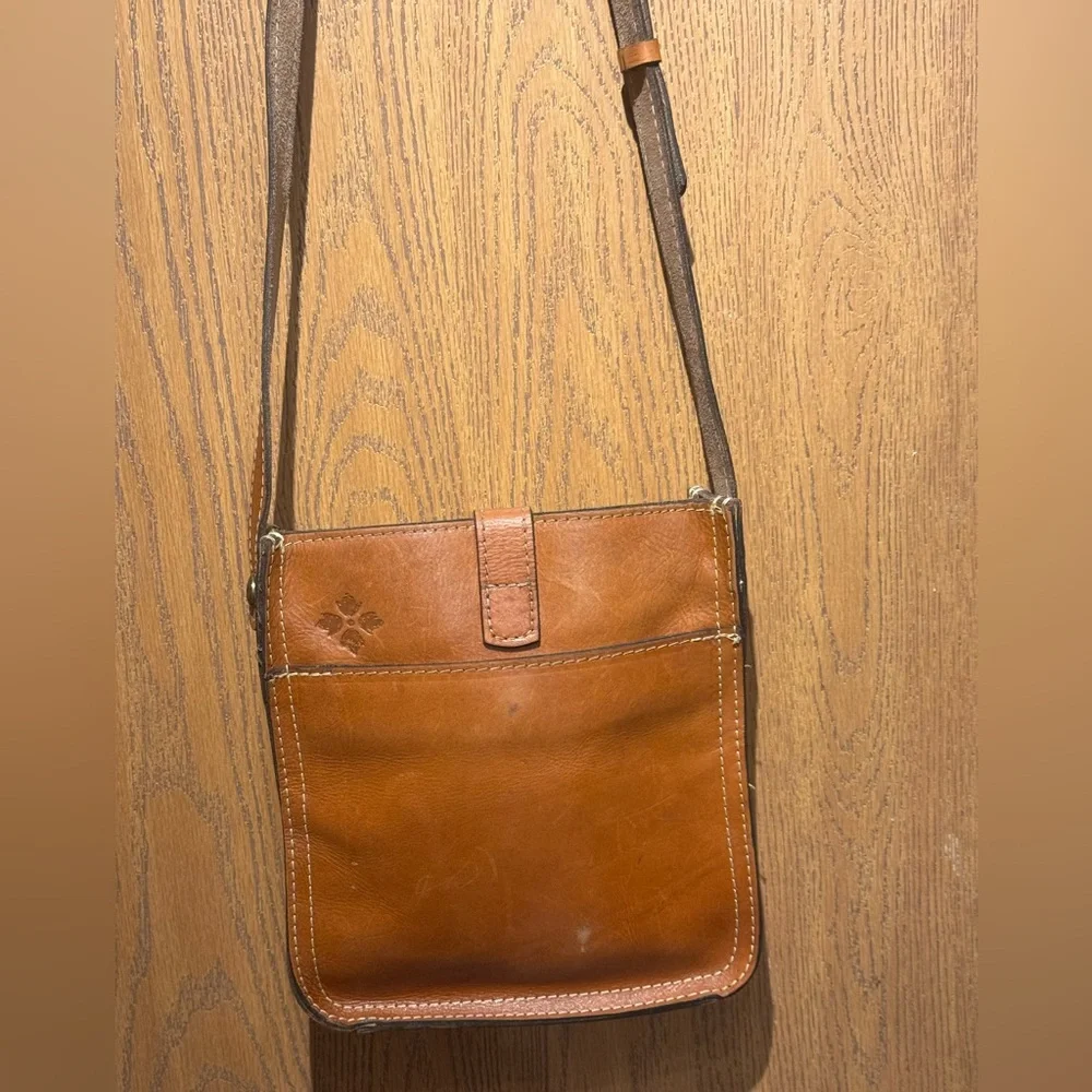 Patricia Nash Venezia Tan Leather Pouch Slim Crossbody Bag.